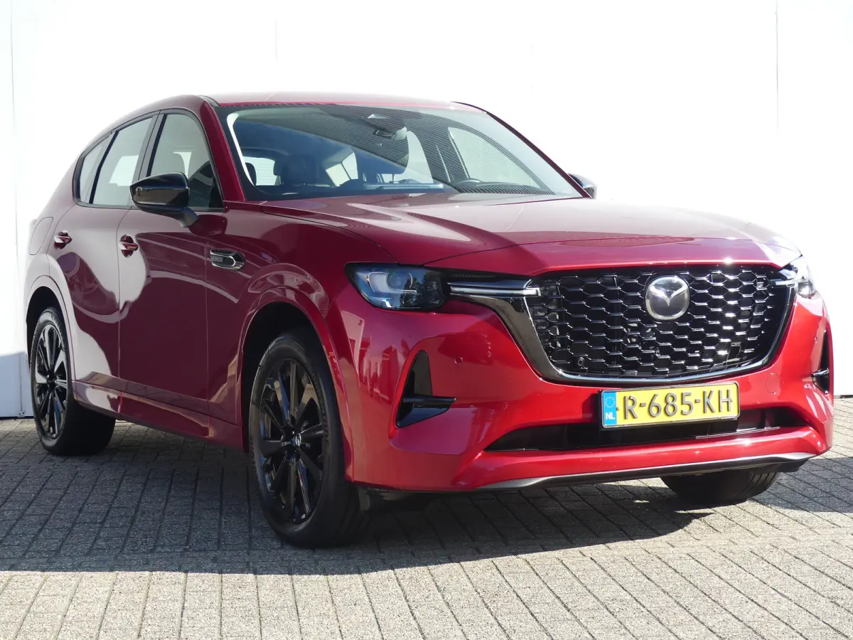 2.5 e-SkyActiv PHEV Homura | TREKHAAK | DODEHOEKDETECTIE | STOEL+STUURVERWARMING | CAMERA | PARKEERSENSOREN V+A | NAVI | LMV 20" | APPLE CARPLAY / ANDROID AUTO | HEAD-UP |