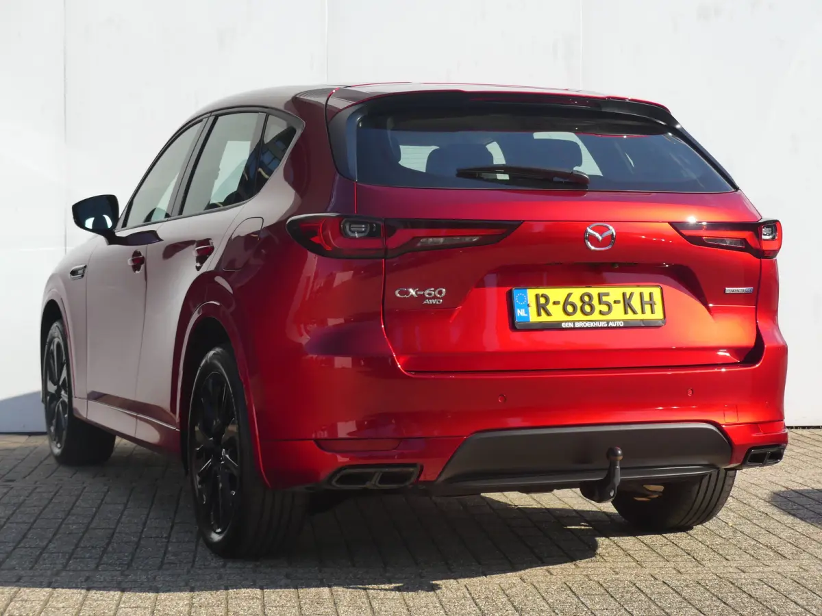 2.5 e-SkyActiv PHEV Homura | TREKHAAK | DODEHOEKDETECTIE | STOEL+STUURVERWARMING | CAMERA | PARKEERSENSOREN V+A | NAVI | LMV 20" | APPLE CARPLAY / ANDROID AUTO | HEAD-UP |