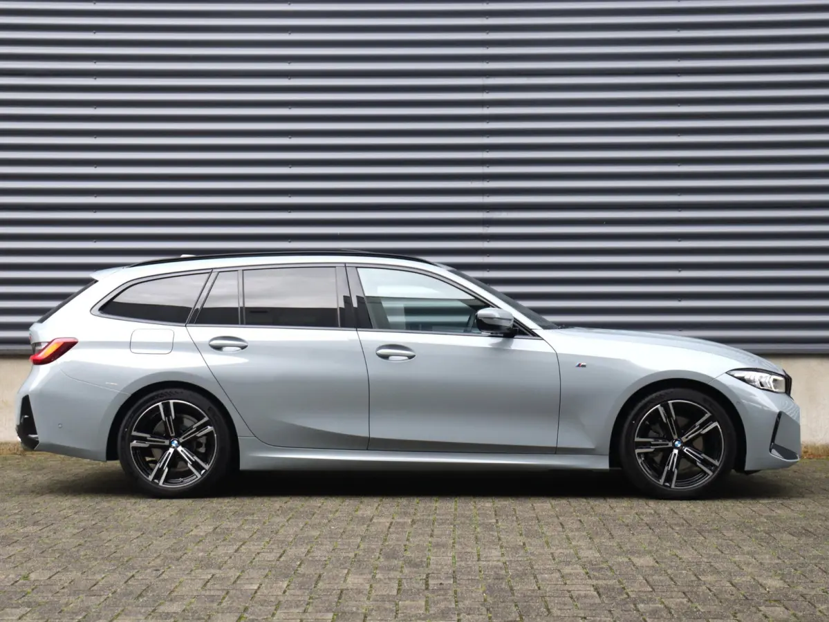 320i | M Sportpakket | Panodak | Trekhaak | Adaptive Cruise Control | Hi-Fi | Camera | Comfort Access | 18'' LMV