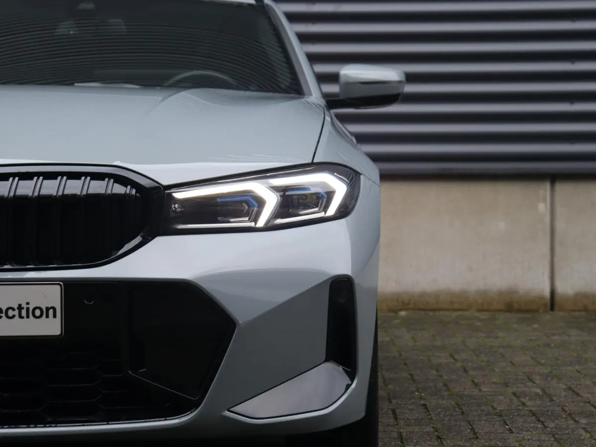 320i | M Sportpakket | Panodak | Trekhaak | Adaptive Cruise Control | Hi-Fi | Camera | Comfort Access | 18'' LMV