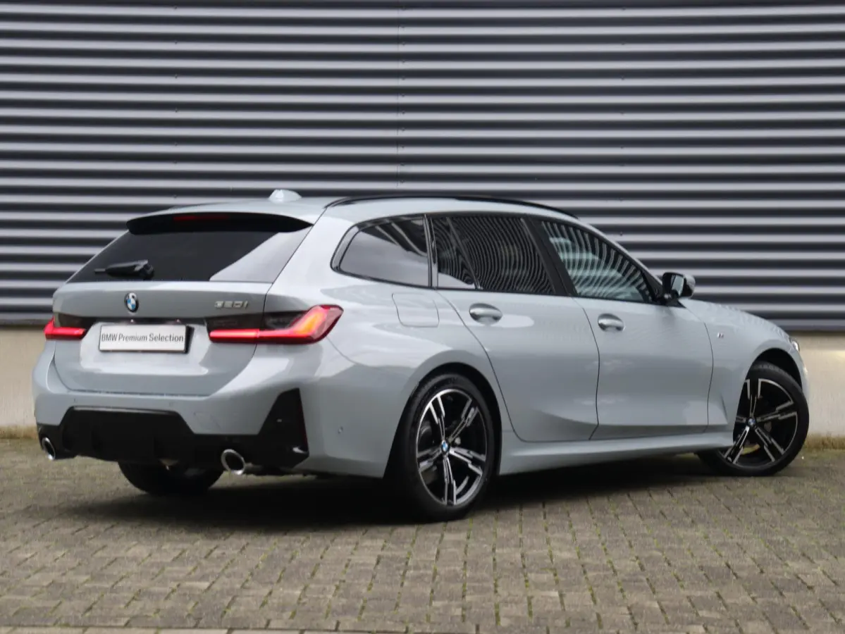 320i | M Sportpakket | Panodak | Trekhaak | Adaptive Cruise Control | Hi-Fi | Camera | Comfort Access | 18'' LMV