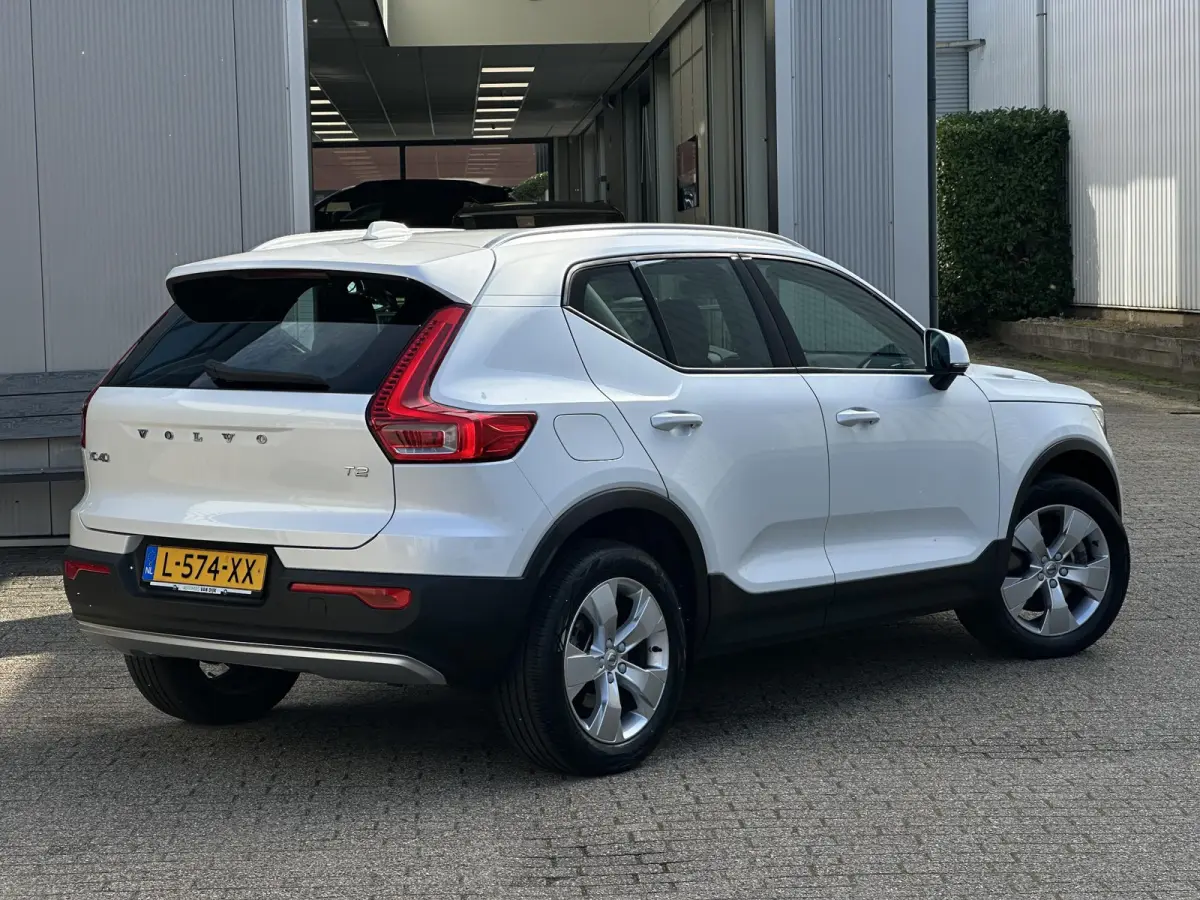 1.5 T2 Momentum Business | Camera/Carplay/Lederen bekleding/Adapt.Cruise/18"