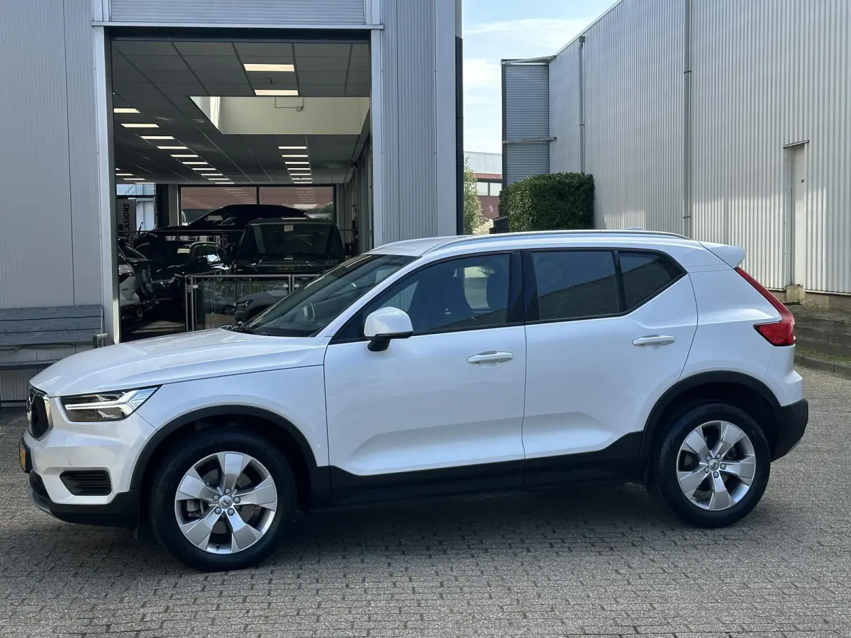 1.5 T2 Momentum Business | Camera/Carplay/Lederen bekleding/Adapt.Cruise/18"