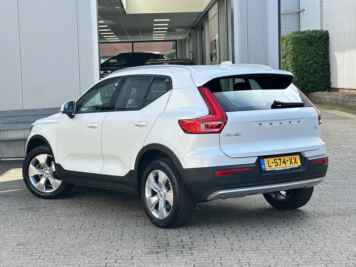 1.5 T2 Momentum Business | Camera/Carplay/Lederen bekleding/Adapt.Cruise/18"