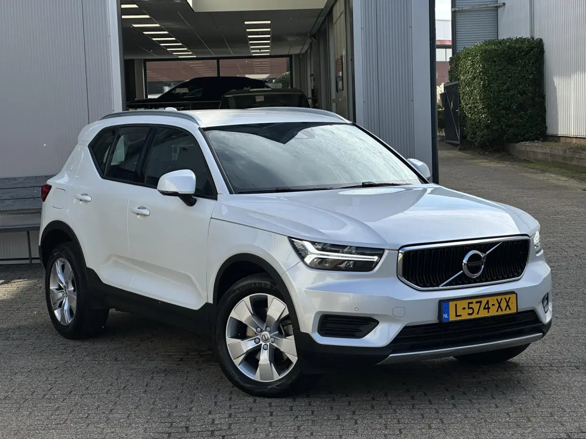 1.5 T2 Momentum Business | Camera/Carplay/Lederen bekleding/Adapt.Cruise/18"