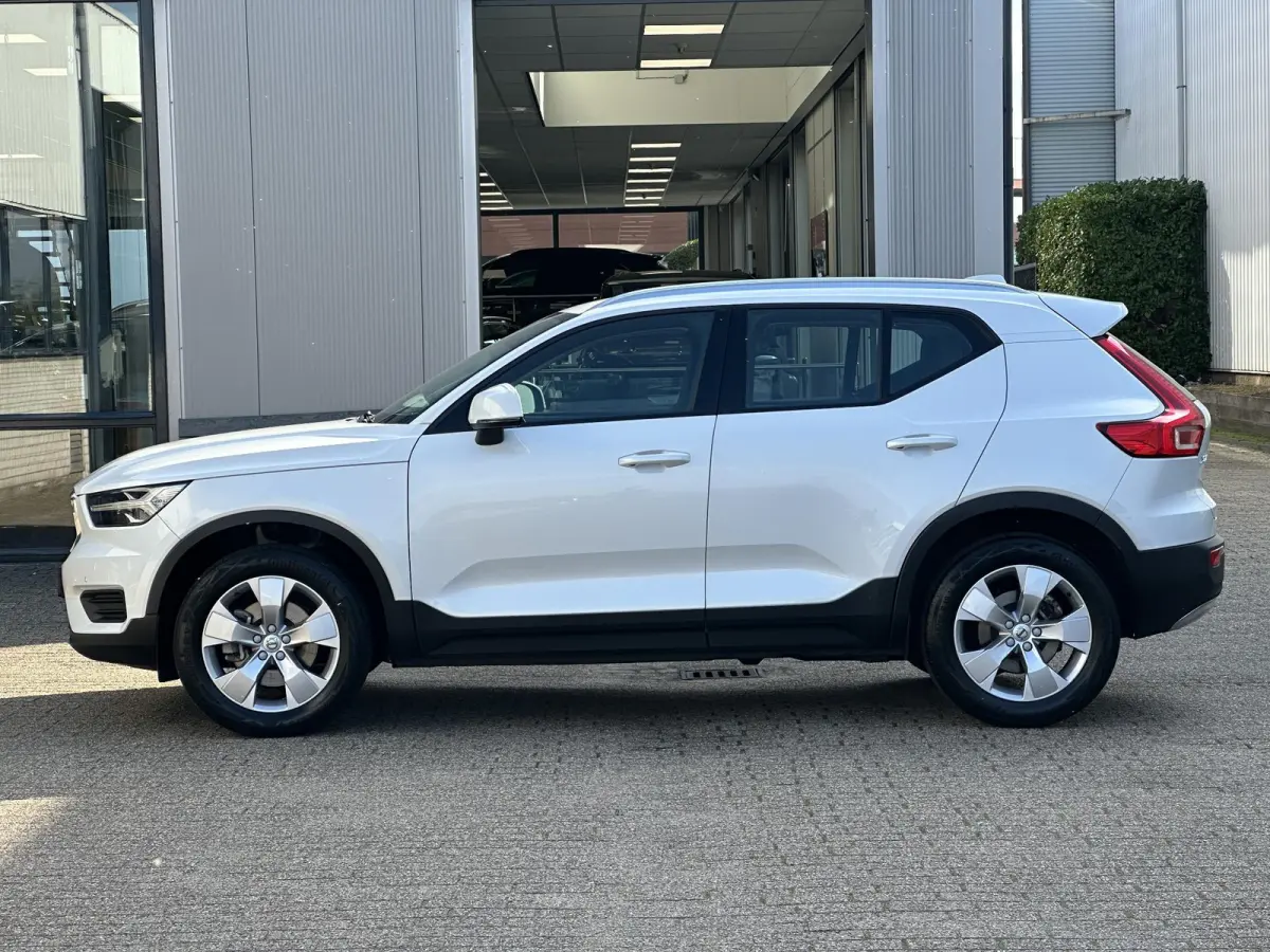 1.5 T2 Momentum Business | Camera/Carplay/Lederen bekleding/Adapt.Cruise/18"