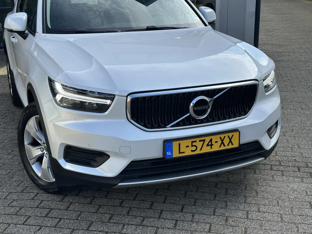 1.5 T2 Momentum Business | Camera/Carplay/Lederen bekleding/Adapt.Cruise/18"