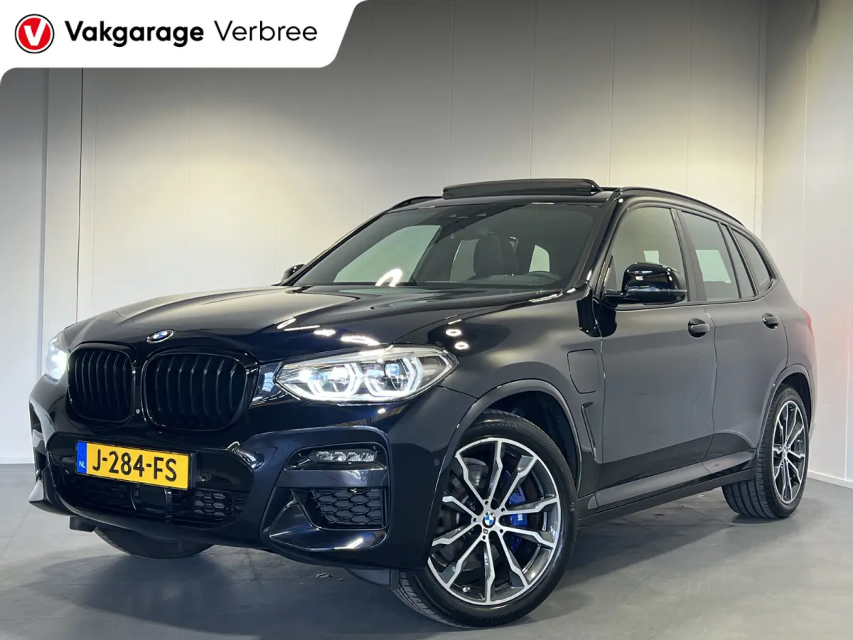 xDrive30e eDrive M-sport | Navigatie/Android/Apple Carplay | LM Velgen 20" | Elektrisch Glazen Panoramadak | Lederen Bekleding | Voorstoelen/Achterbank Verwarmd | Achteruitrijcamera | Adapti