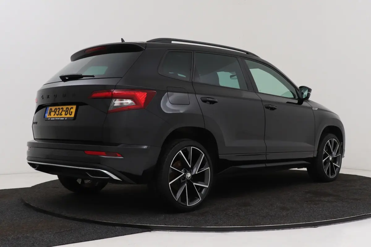 1.5 TSI Sportline Business | Uitklap Trekhaak | Camera | Stuur-/Stoelverwarming | Climate Control | CarPlay |