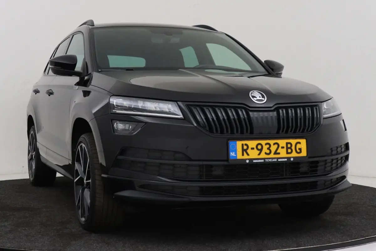 1.5 TSI Sportline Business | Uitklap Trekhaak | Camera | Stuur-/Stoelverwarming | Climate Control | CarPlay |