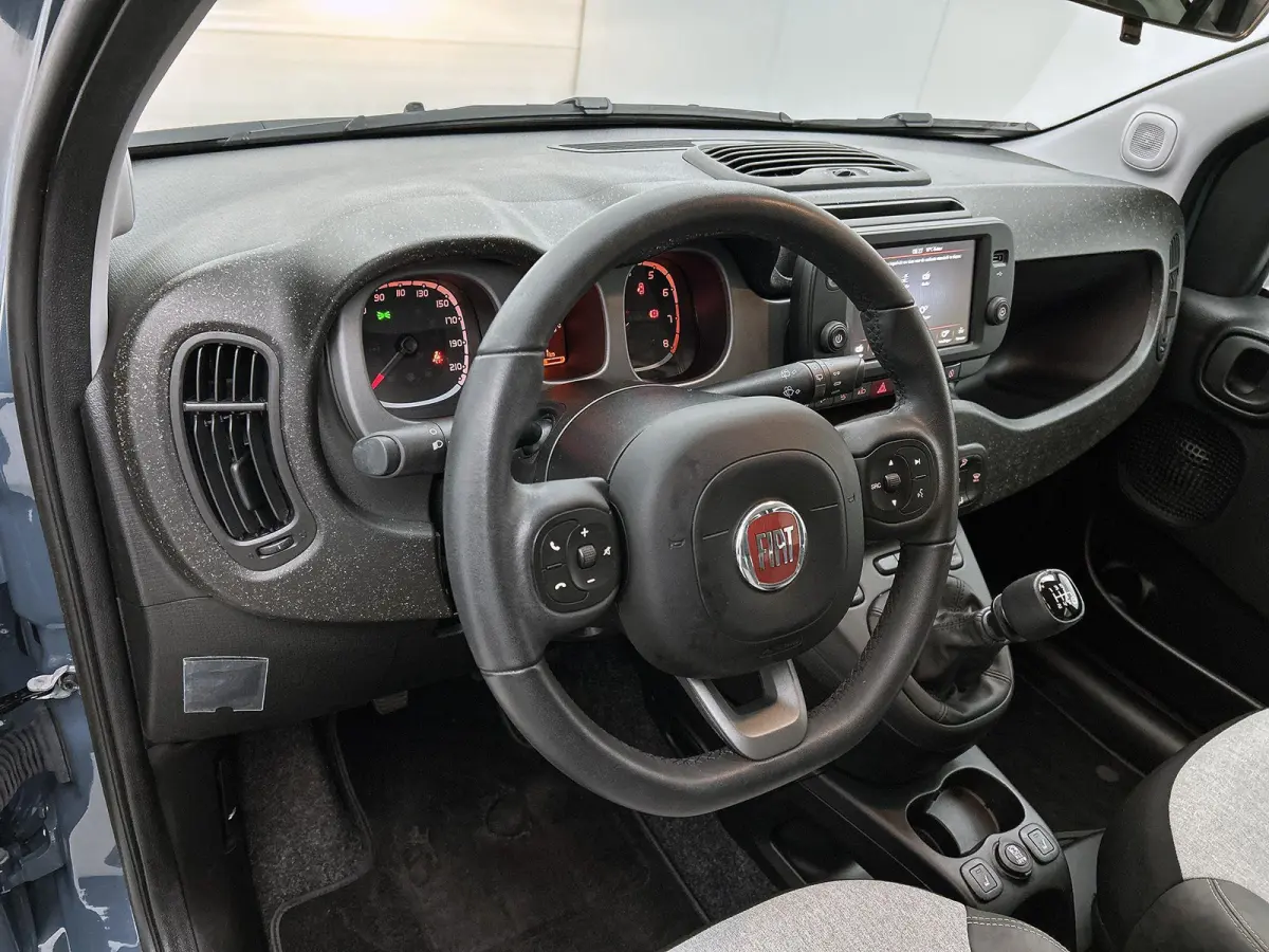 1.0 70pk Hybrid Cross | Stoelverwarming | Stoelverwarming | Climate Control | Parkeersensoren | Cruise Control | 15"LMV |