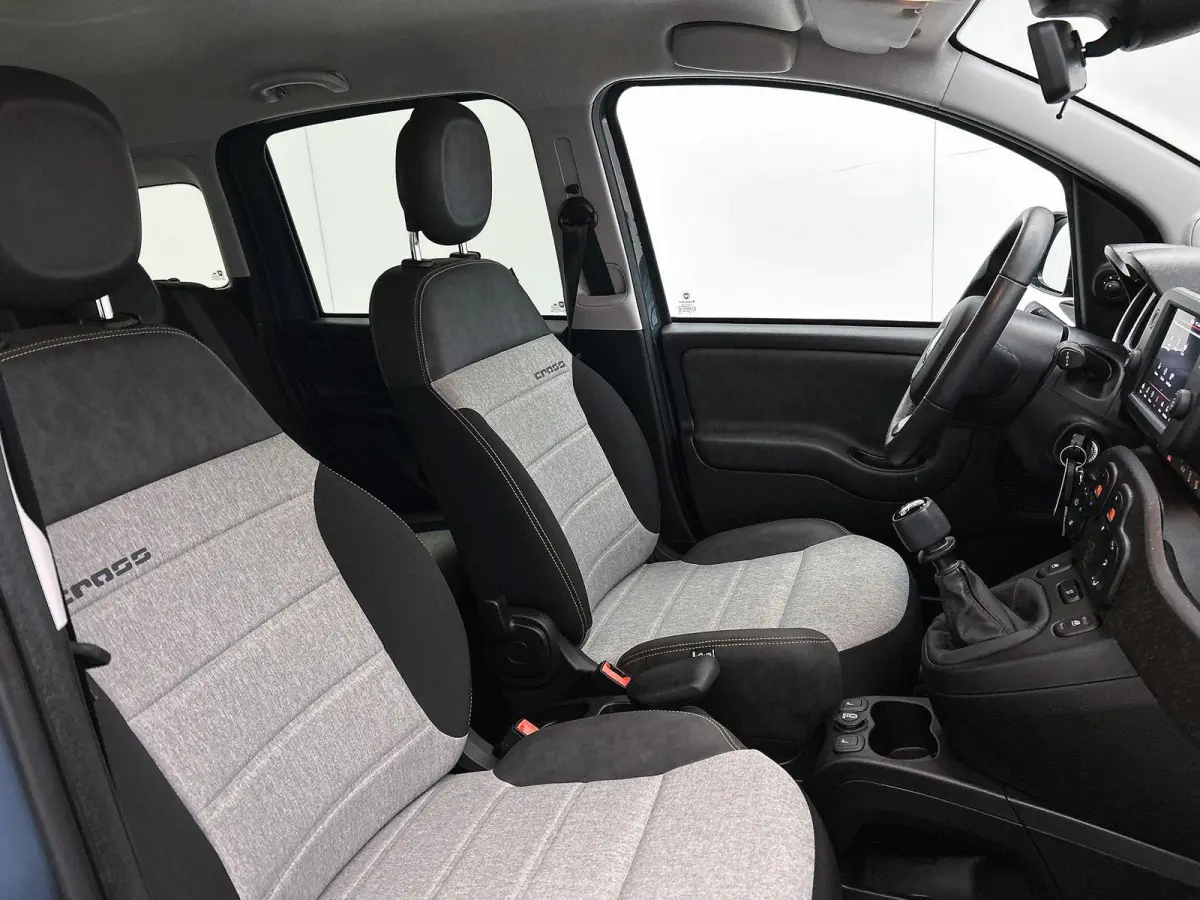 1.0 70pk Hybrid Cross | Stoelverwarming | Stoelverwarming | Climate Control | Parkeersensoren | Cruise Control | 15"LMV |
