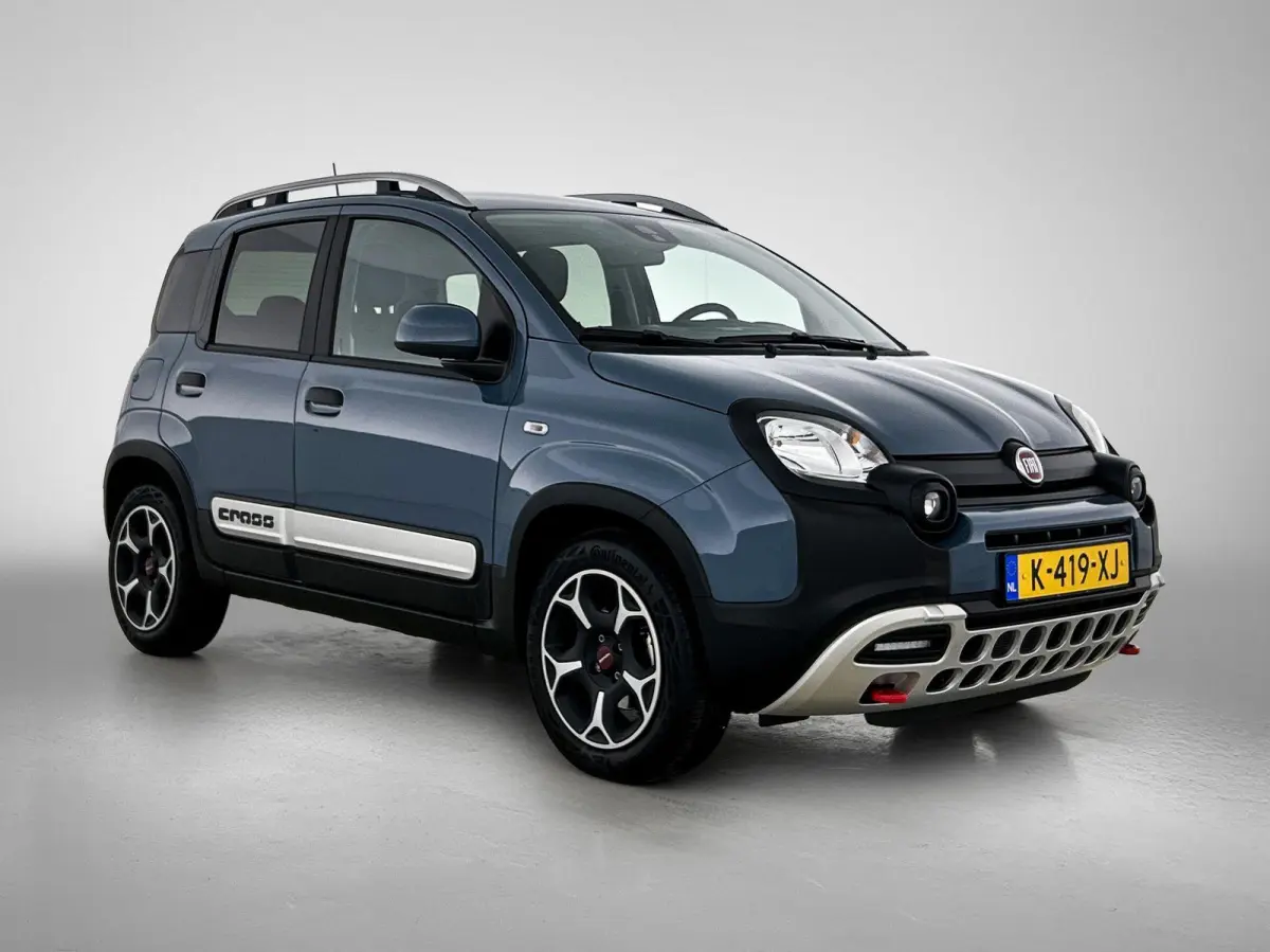 1.0 70pk Hybrid Cross | Stoelverwarming | Stoelverwarming | Climate Control | Parkeersensoren | Cruise Control | 15"LMV |