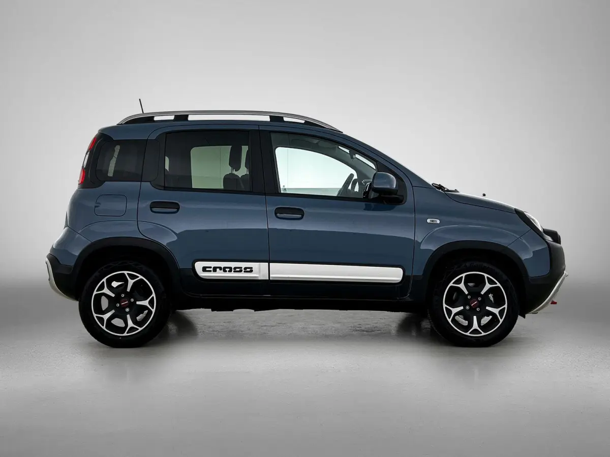 1.0 70pk Hybrid Cross | Stoelverwarming | Stoelverwarming | Climate Control | Parkeersensoren | Cruise Control | 15"LMV |