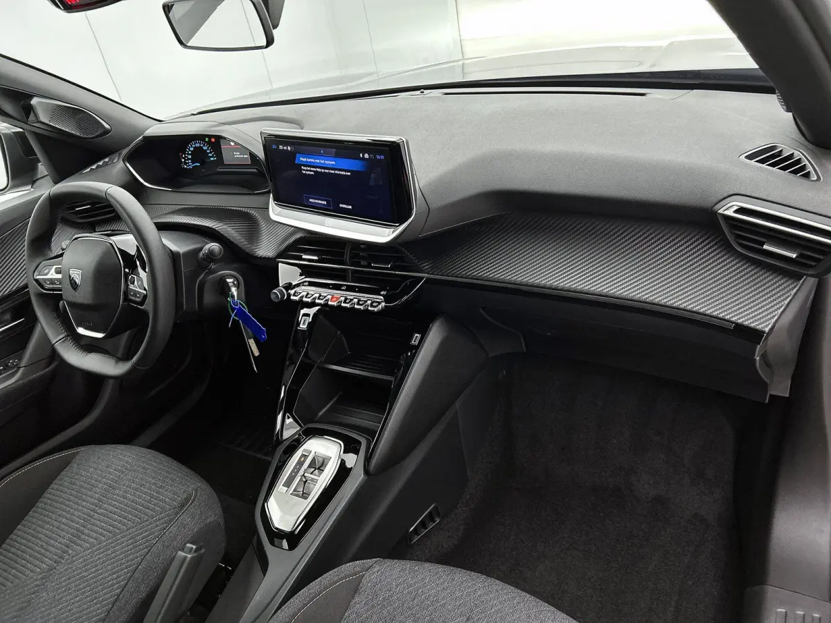 1.2 Hybrid 110pk Business Automaat | VOORRAAD VOORDEEL | Navigatie | Climate Control | Cruise Control | Parkeersensoren | LED | Apple Carplay/Android Auto |