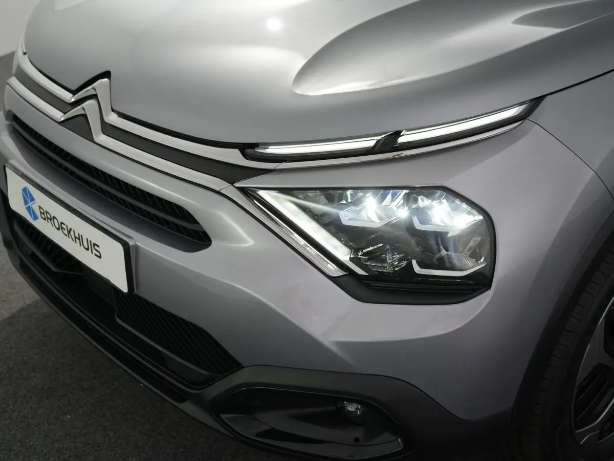 Plus 54 kWh | Carplay | Camera | Cruise | Clima | 18"LMV | Parkeersensoren |