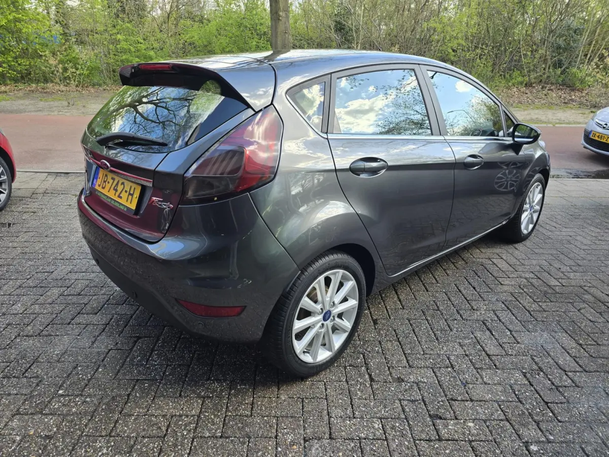 1.0 EcoBoost Titanium | 2E EIGENAAR | 12MND GARANTIE | NW DISTR | AIRCO | NAVI |