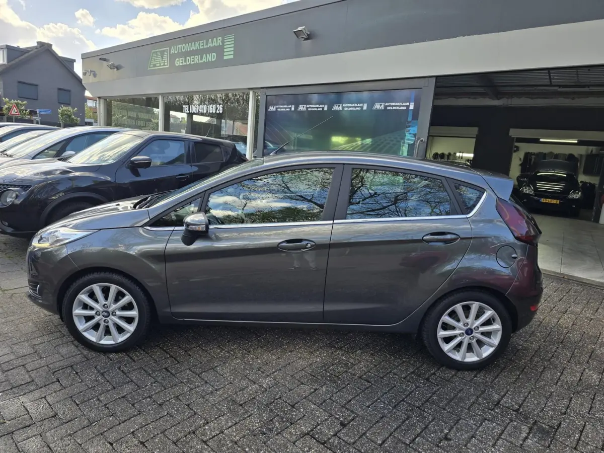 1.0 EcoBoost Titanium | 2E EIGENAAR | 12MND GARANTIE | NW DISTR | AIRCO | NAVI |