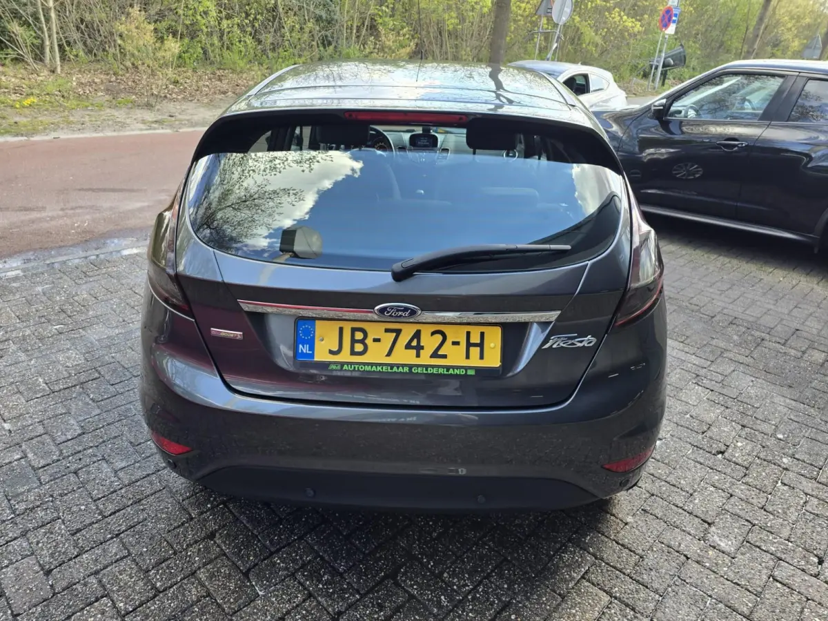 1.0 EcoBoost Titanium | 2E EIGENAAR | 12MND GARANTIE | NW DISTR | AIRCO | NAVI |