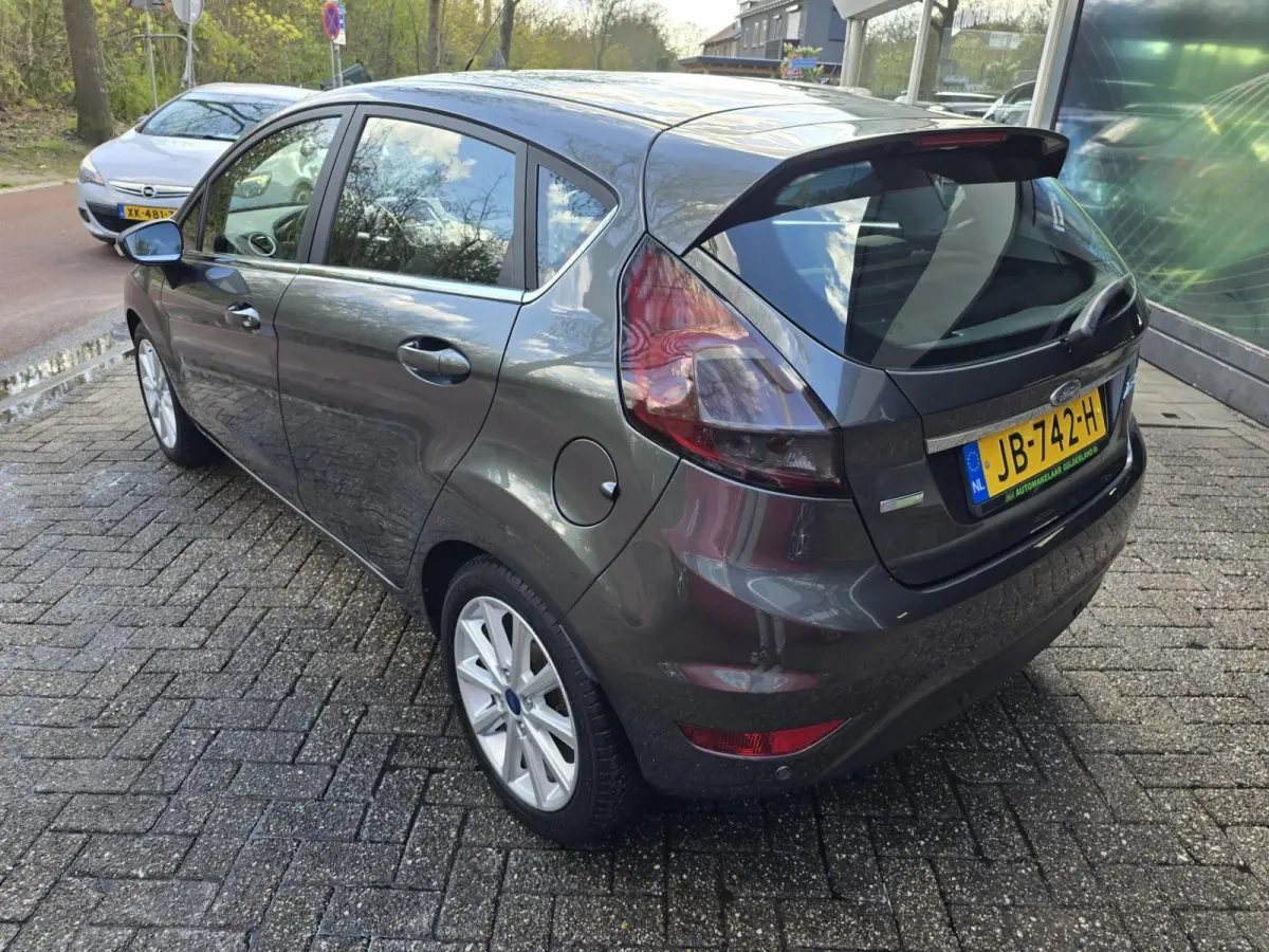 1.0 EcoBoost Titanium | 2E EIGENAAR | 12MND GARANTIE | NW DISTR | AIRCO | NAVI |