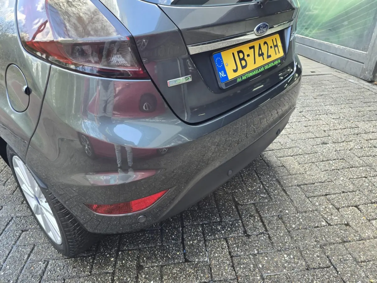 1.0 EcoBoost Titanium | 2E EIGENAAR | 12MND GARANTIE | NW DISTR | AIRCO | NAVI |