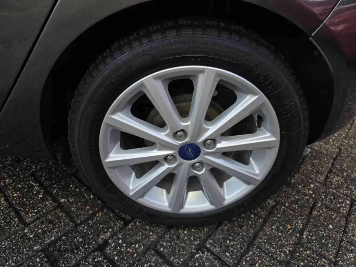 1.0 EcoBoost Titanium | 2E EIGENAAR | 12MND GARANTIE | NW DISTR | AIRCO | NAVI |