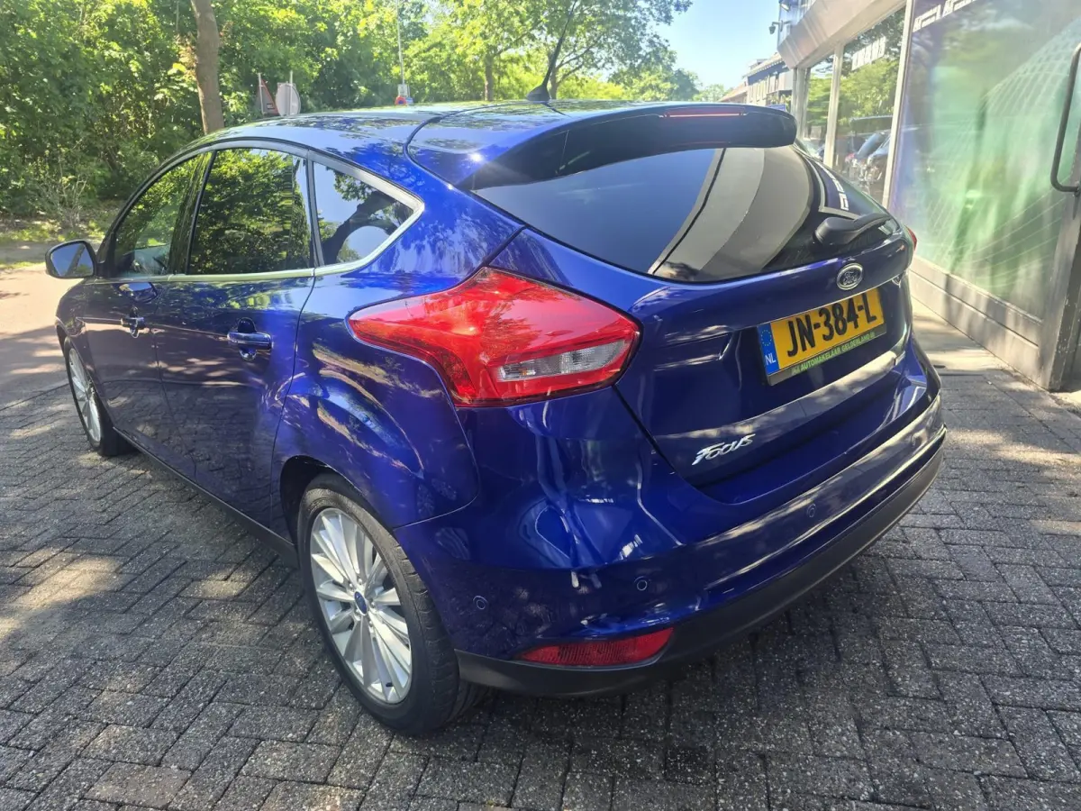 1.0 Titanium | 2E EIGENAAR |3/6 OF 12MND GARANTIE | AIRCO | CRUISE | NAVI | LMV |