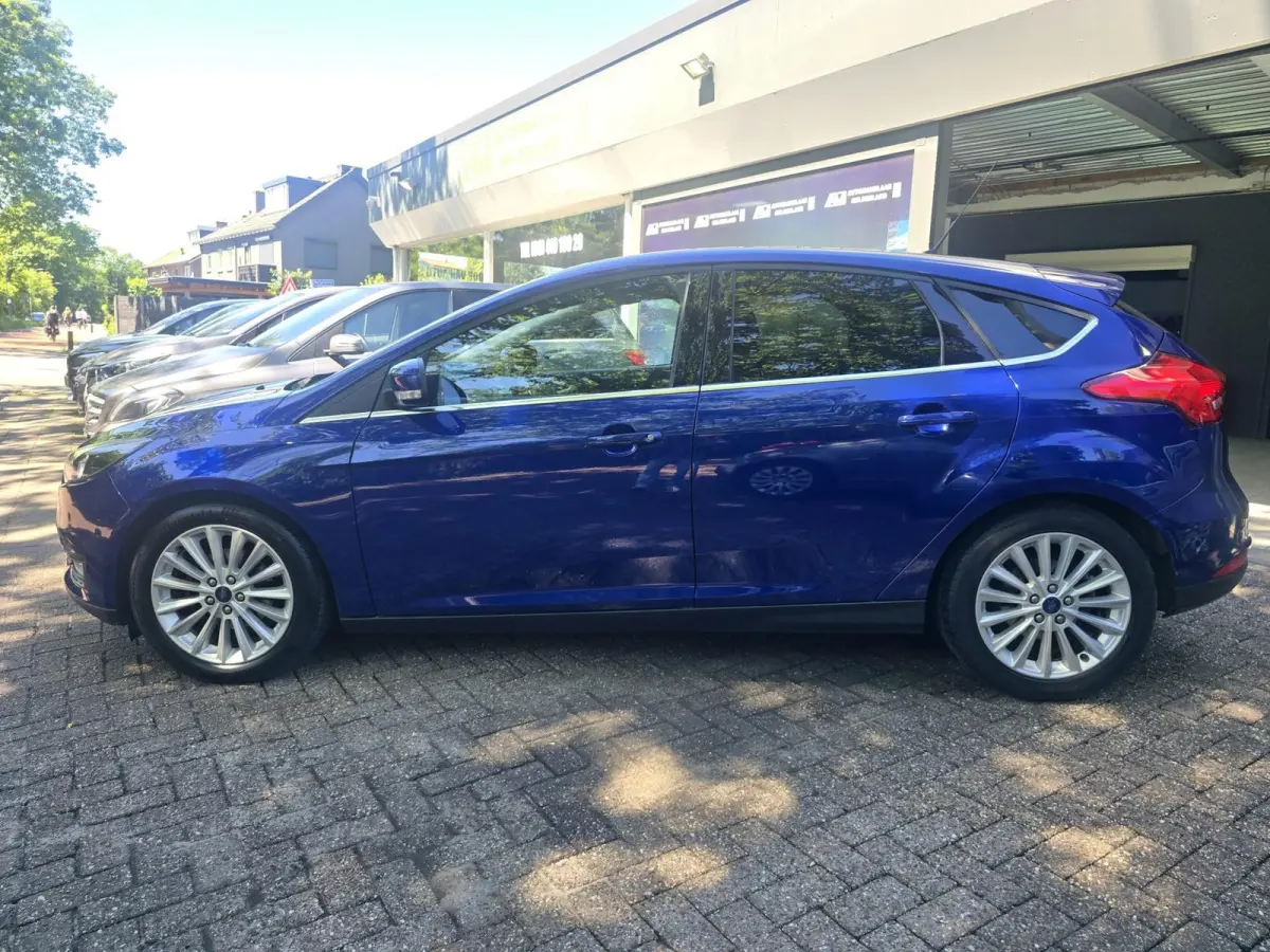 1.0 Titanium | 2E EIGENAAR |3/6 OF 12MND GARANTIE | AIRCO | CRUISE | NAVI | LMV |