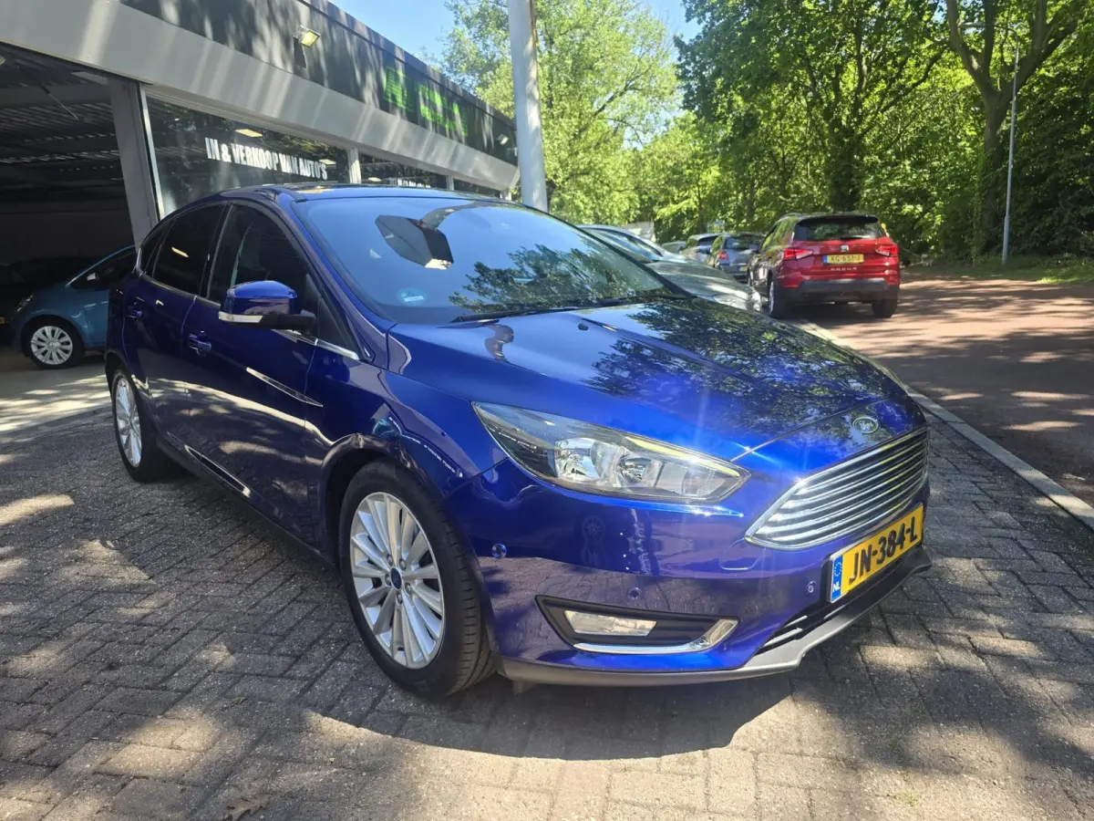 1.0 Titanium | 2E EIGENAAR |3/6 OF 12MND GARANTIE | AIRCO | CRUISE | NAVI | LMV |