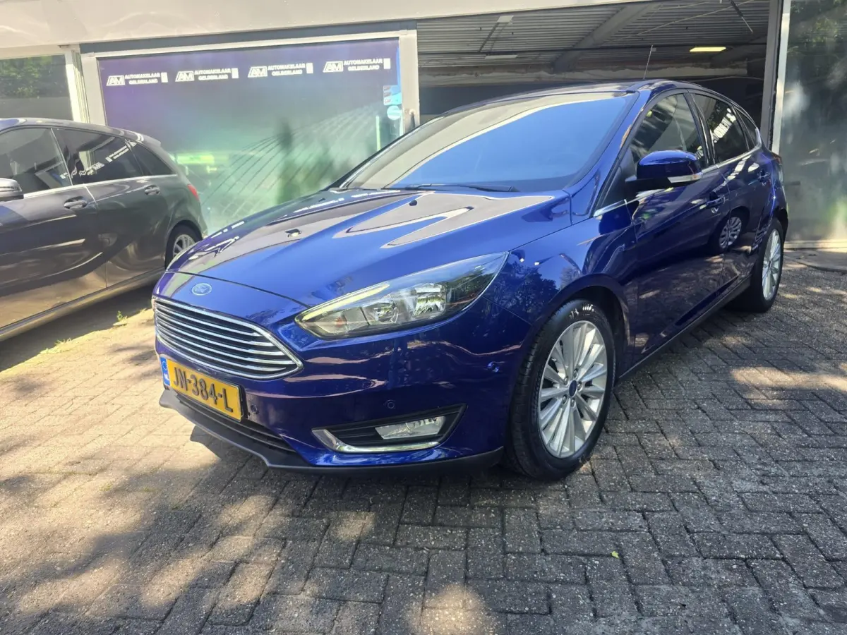 1.0 Titanium | 2E EIGENAAR |3/6 OF 12MND GARANTIE | AIRCO | CRUISE | NAVI | LMV |