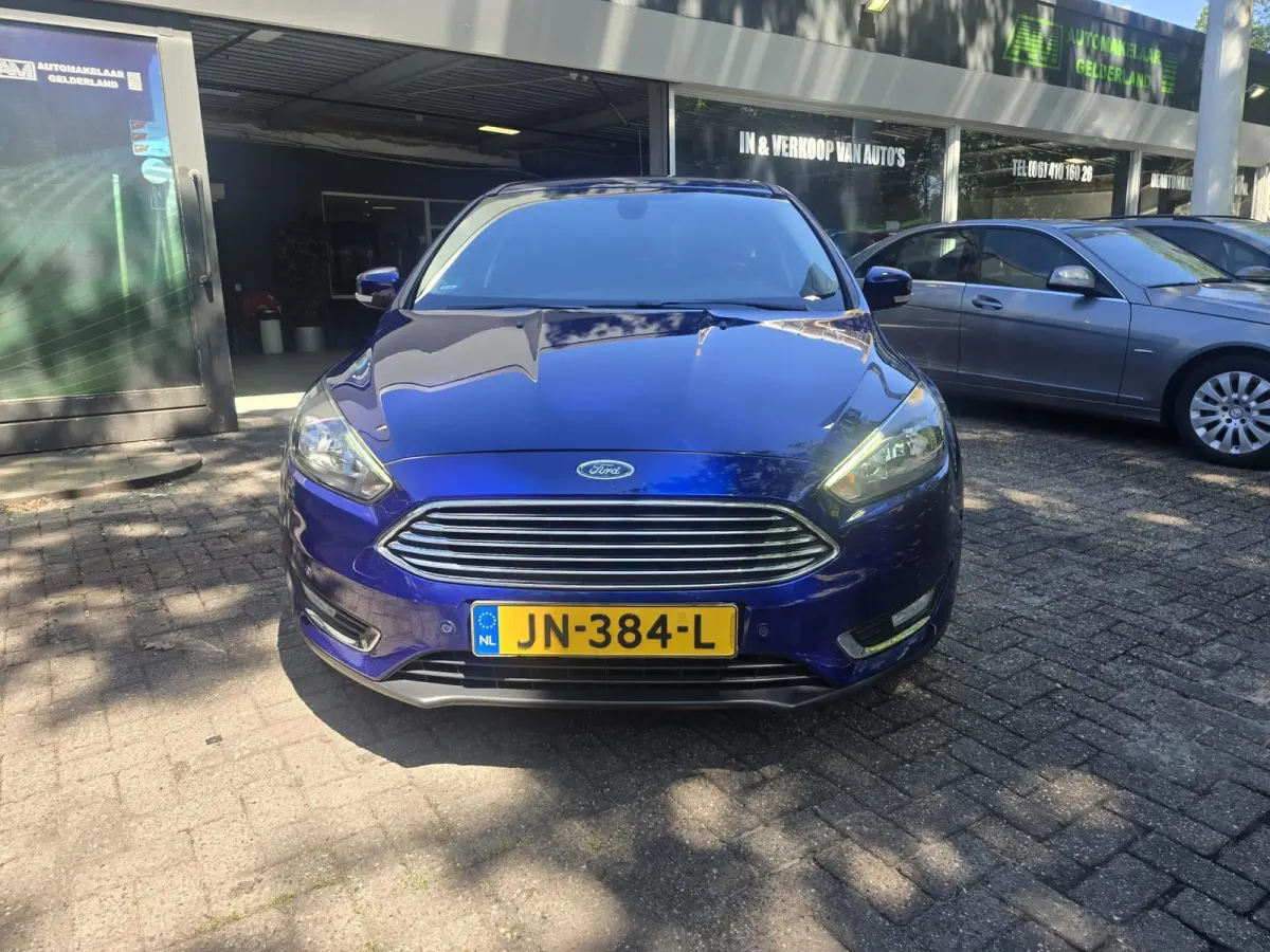 1.0 Titanium | 2E EIGENAAR |3/6 OF 12MND GARANTIE | AIRCO | CRUISE | NAVI | LMV |