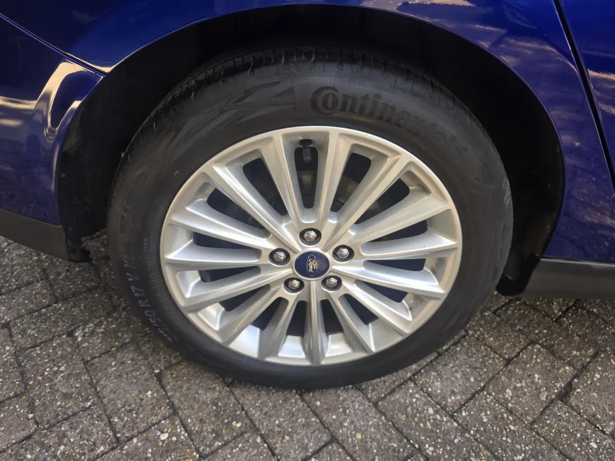 1.0 Titanium | 2E EIGENAAR |3/6 OF 12MND GARANTIE | AIRCO | CRUISE | NAVI | LMV |