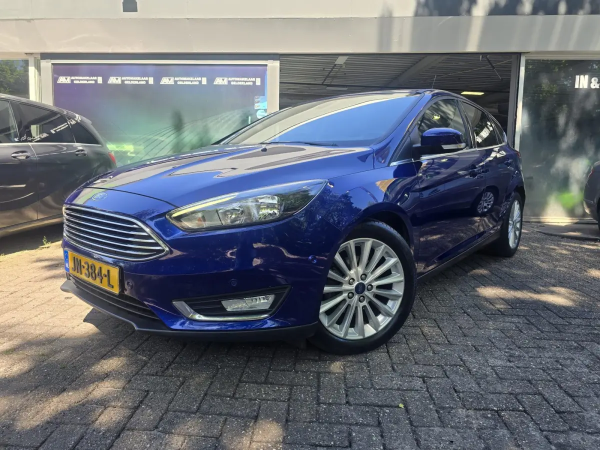 1.0 Titanium | 2E EIGENAAR |3/6 OF 12MND GARANTIE | AIRCO | CRUISE | NAVI | LMV |