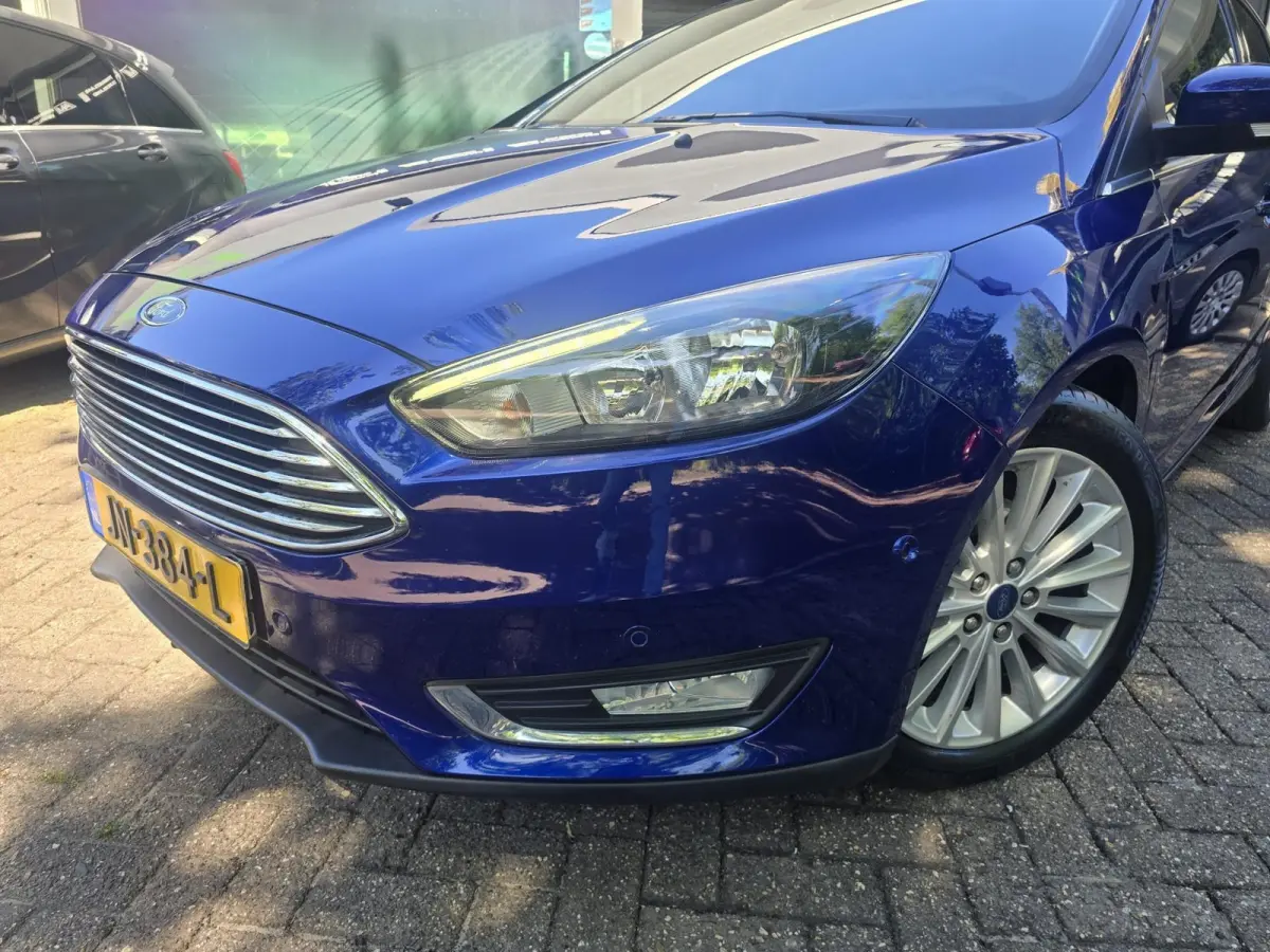 1.0 Titanium | 2E EIGENAAR |3/6 OF 12MND GARANTIE | AIRCO | CRUISE | NAVI | LMV |