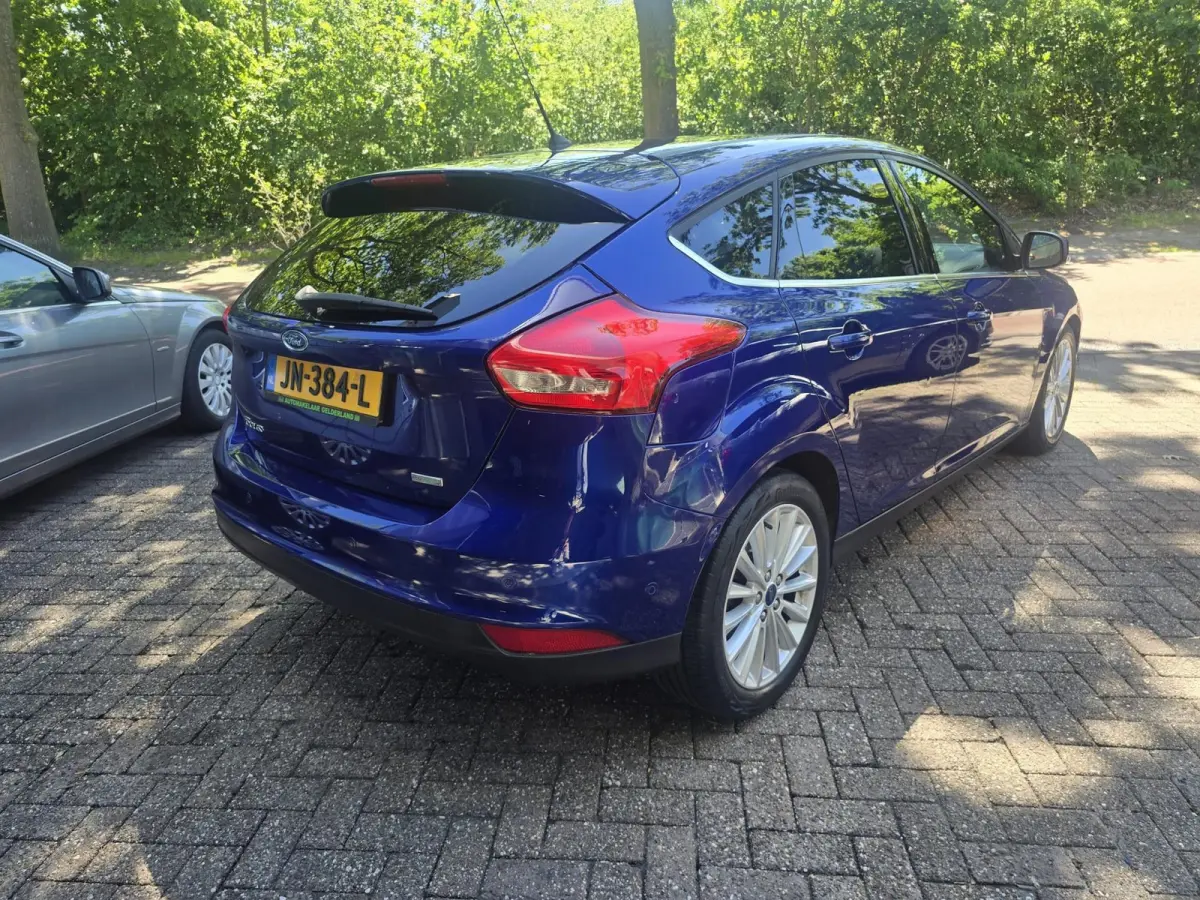 1.0 Titanium | 2E EIGENAAR |3/6 OF 12MND GARANTIE | AIRCO | CRUISE | NAVI | LMV |