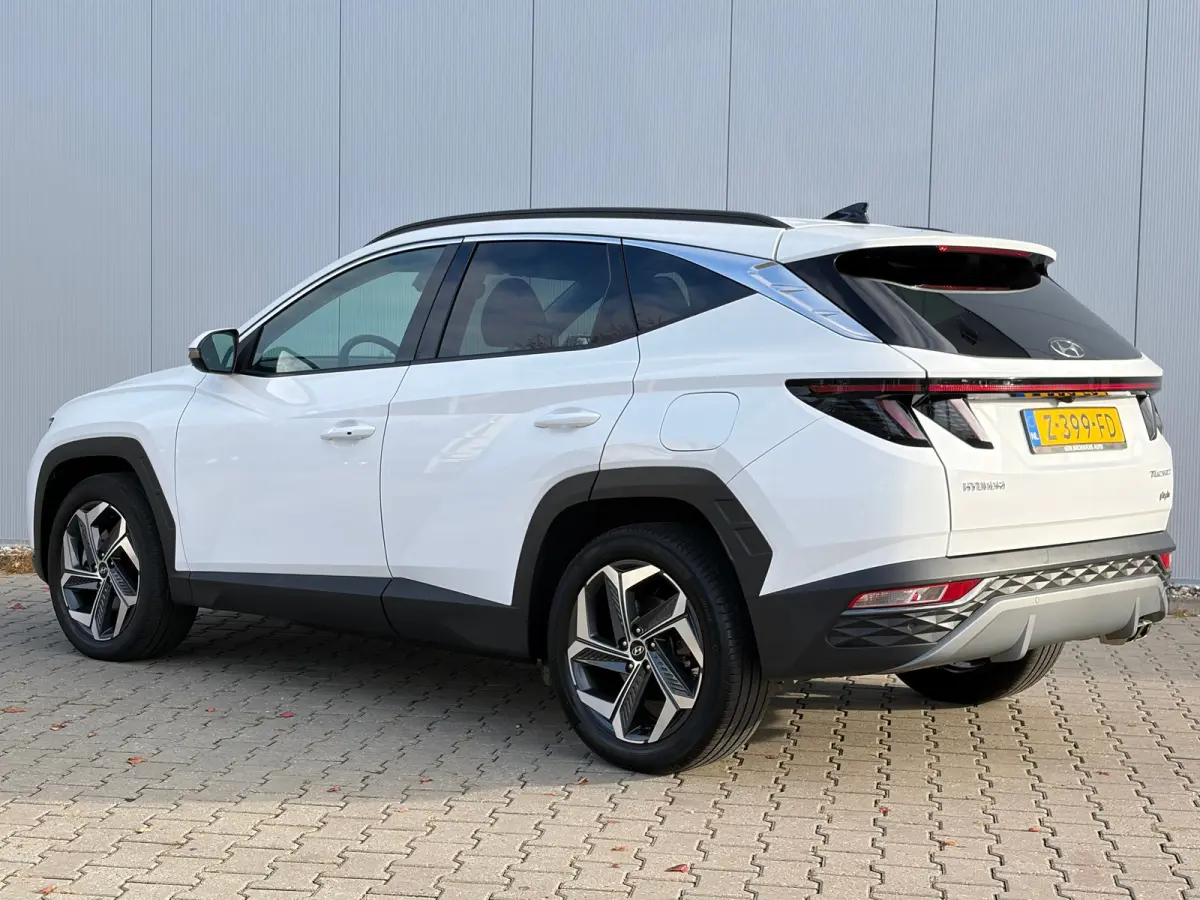 1.6 T-GDI 265pk PHEV Comfort Smart 4WD | Climate | Camera | Carplay | Keyless | Navigatie | Full - Led | Elek. Klep | Winterpakket | 19" Lichtmetaal | Krell Audio | Digitale Cockpit | Parkee