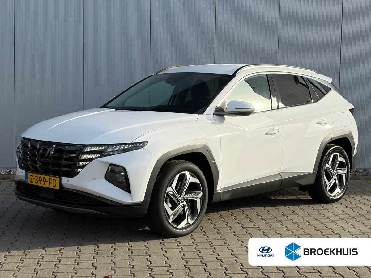 1.6 T-GDI 265pk PHEV Comfort Smart 4WD | Climate | Camera | Carplay | Keyless | Navigatie | Full - Led | Elek. Klep | Winterpakket | 19" Lichtmetaal | Krell Audio | Digitale Cockpit | Parkee