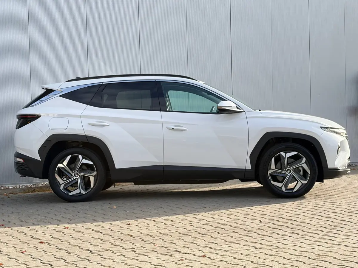 1.6 T-GDI 265pk PHEV Comfort Smart 4WD | Climate | Camera | Carplay | Keyless | Navigatie | Full - Led | Elek. Klep | Winterpakket | 19" Lichtmetaal | Krell Audio | Digitale Cockpit | Parkee