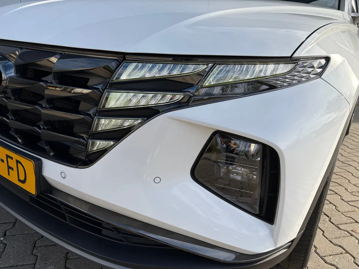 1.6 T-GDI 265pk PHEV Comfort Smart 4WD | Climate | Camera | Carplay | Keyless | Navigatie | Full - Led | Elek. Klep | Winterpakket | 19" Lichtmetaal | Krell Audio | Digitale Cockpit | Parkee