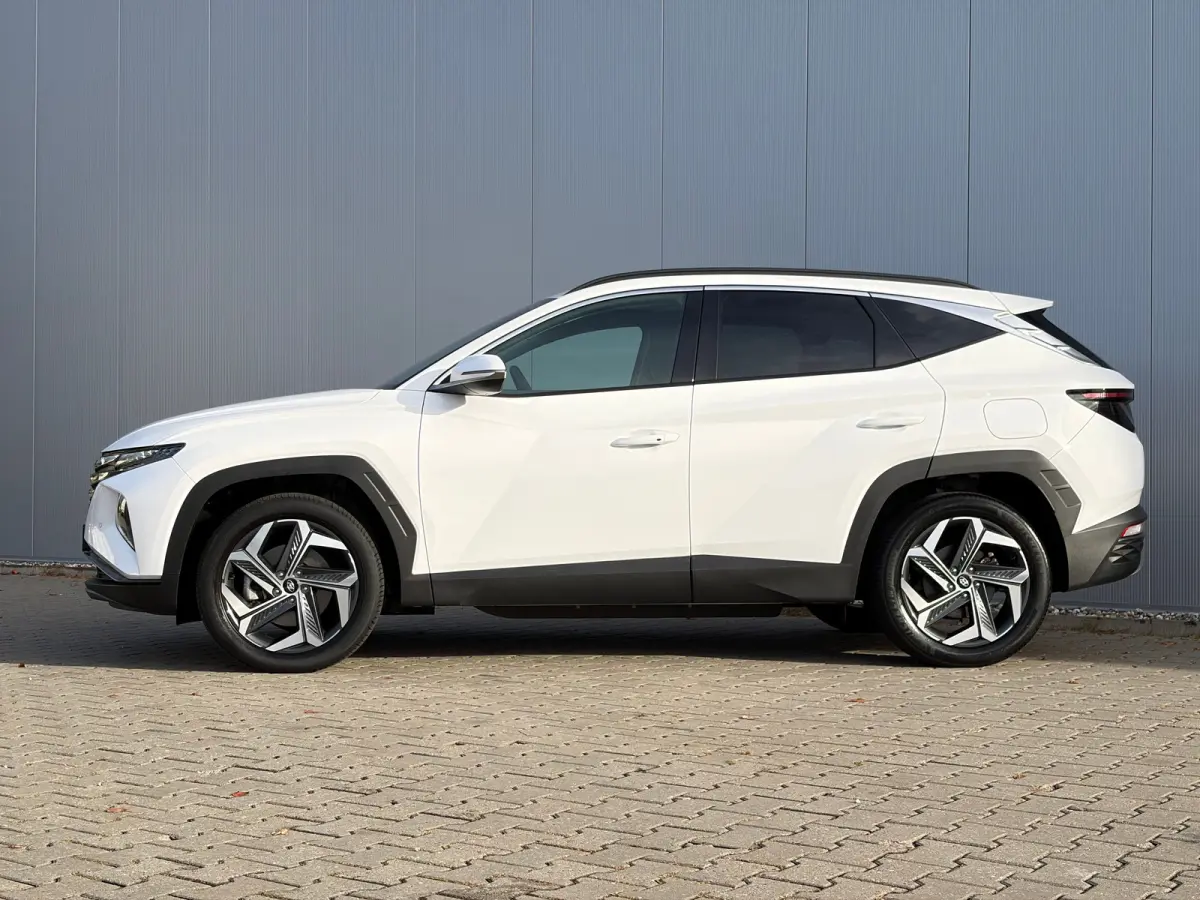 1.6 T-GDI 265pk PHEV Comfort Smart 4WD | Climate | Camera | Carplay | Keyless | Navigatie | Full - Led | Elek. Klep | Winterpakket | 19" Lichtmetaal | Krell Audio | Digitale Cockpit | Parkee