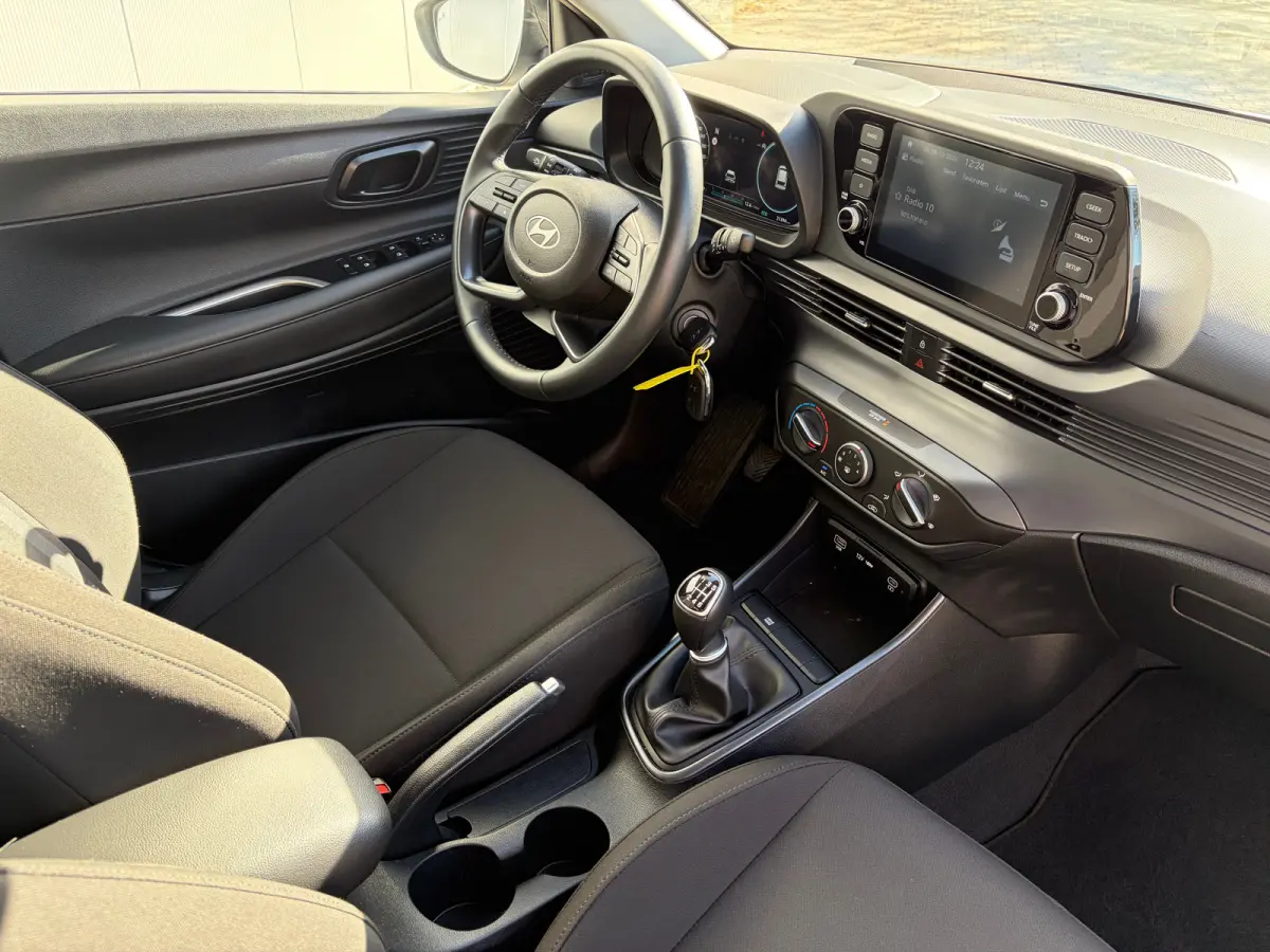 1.0 T-GDI 100pk Comfort | Airco | Camera | Carplay | Cruise control | Dodehoek detectie | Navigatie | Parkeersensoren | Digitaal cockpit | Lichtmetalen velgen