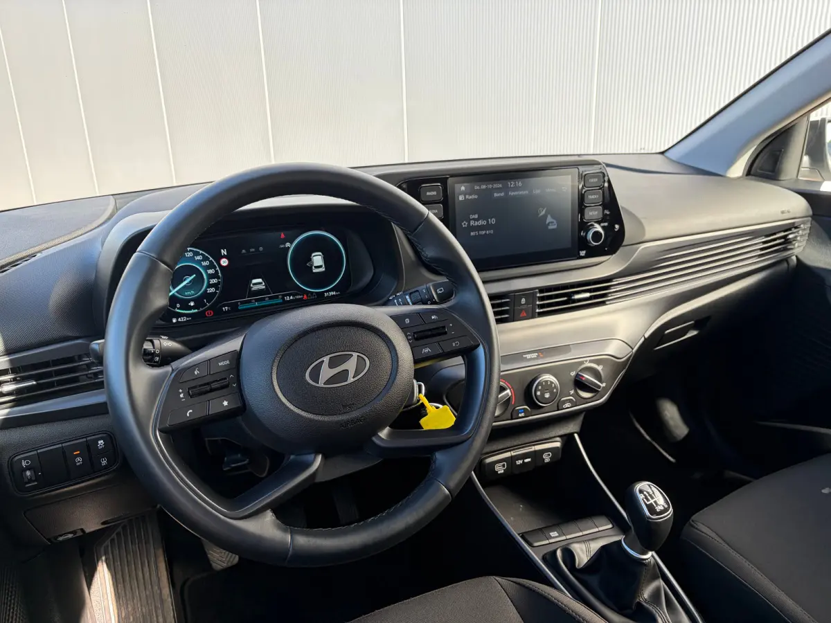 1.0 T-GDI 100pk Comfort | Airco | Camera | Carplay | Cruise control | Dodehoek detectie | Navigatie | Parkeersensoren | Digitaal cockpit | Lichtmetalen velgen