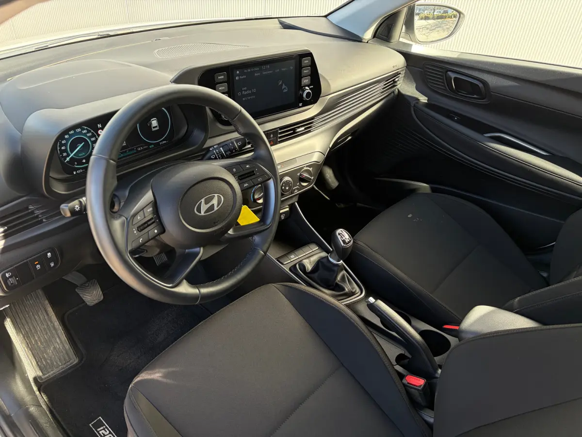 1.0 T-GDI 100pk Comfort | Airco | Camera | Carplay | Cruise control | Dodehoek detectie | Navigatie | Parkeersensoren | Digitaal cockpit | Lichtmetalen velgen
