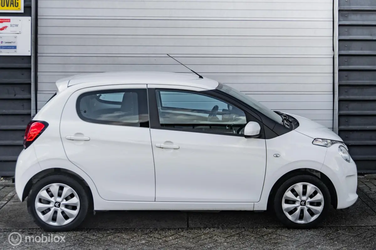 1.0 VTi Shine |Stoelverwarming|Camera|Carplay