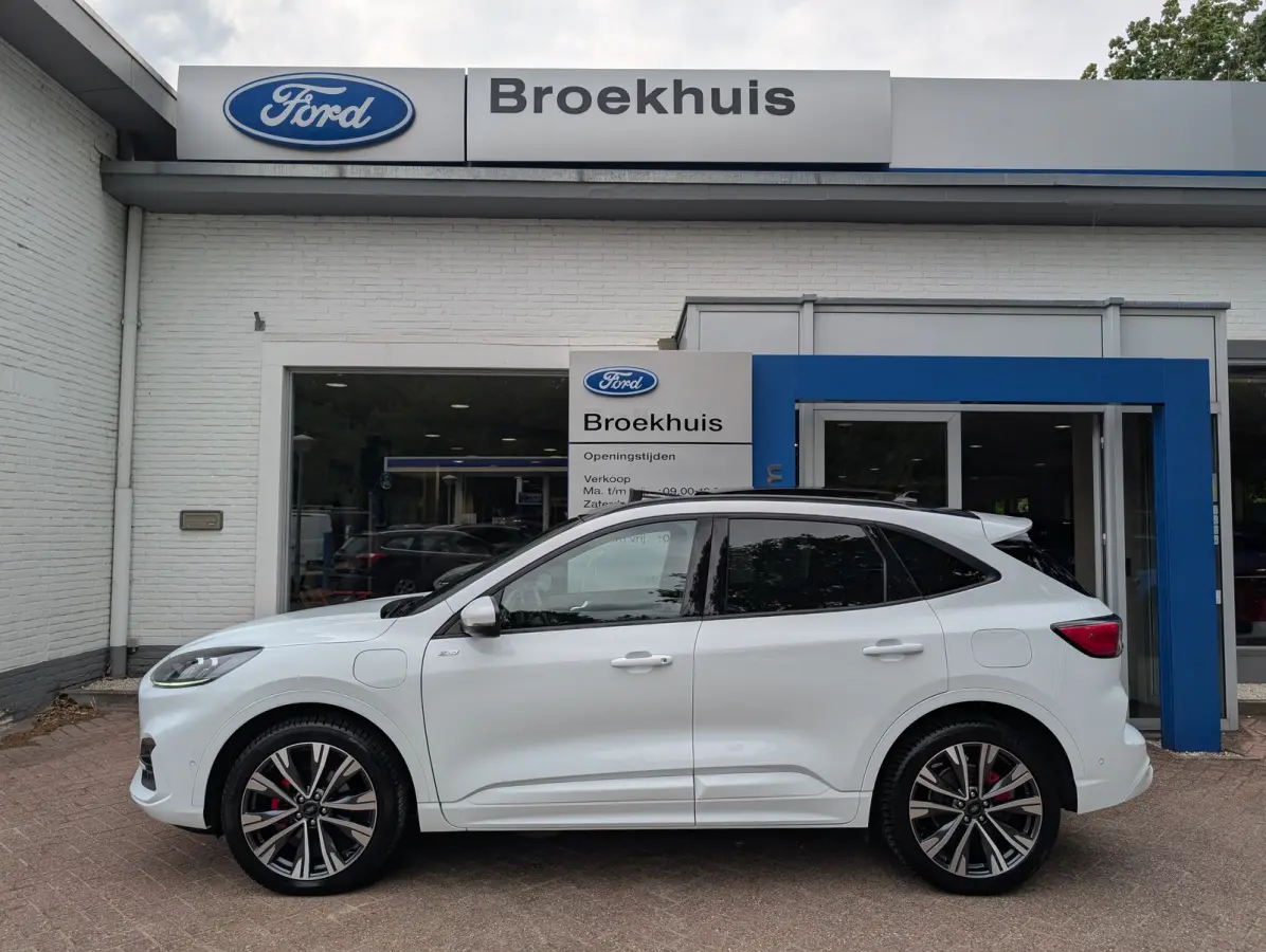 2.5 PHEV Vignale l Slecht 57dkM! l Afn. Trekhaak l Elektr. Stoel l Stoelverwarming l Pano Dak l Side Assist l Camera l