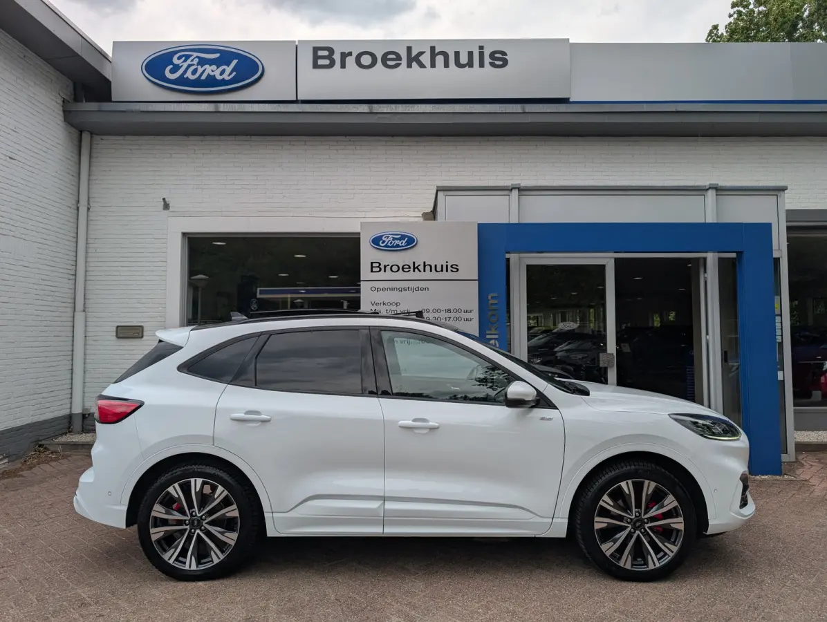 2.5 PHEV Vignale l Slecht 57dkM! l Afn. Trekhaak l Elektr. Stoel l Stoelverwarming l Pano Dak l Side Assist l Camera l