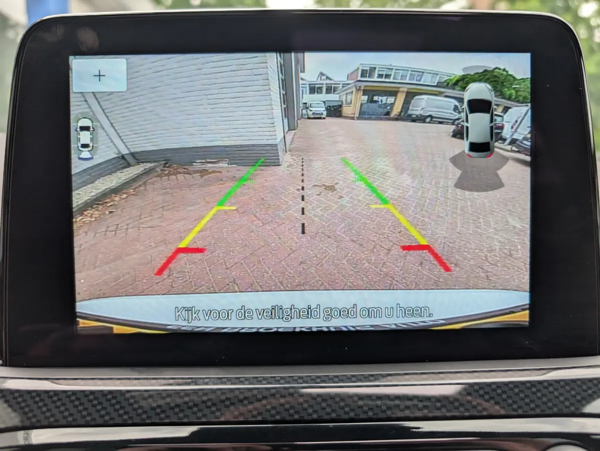 2.5 PHEV Vignale l Slecht 57dkM! l Afn. Trekhaak l Elektr. Stoel l Stoelverwarming l Pano Dak l Side Assist l Camera l