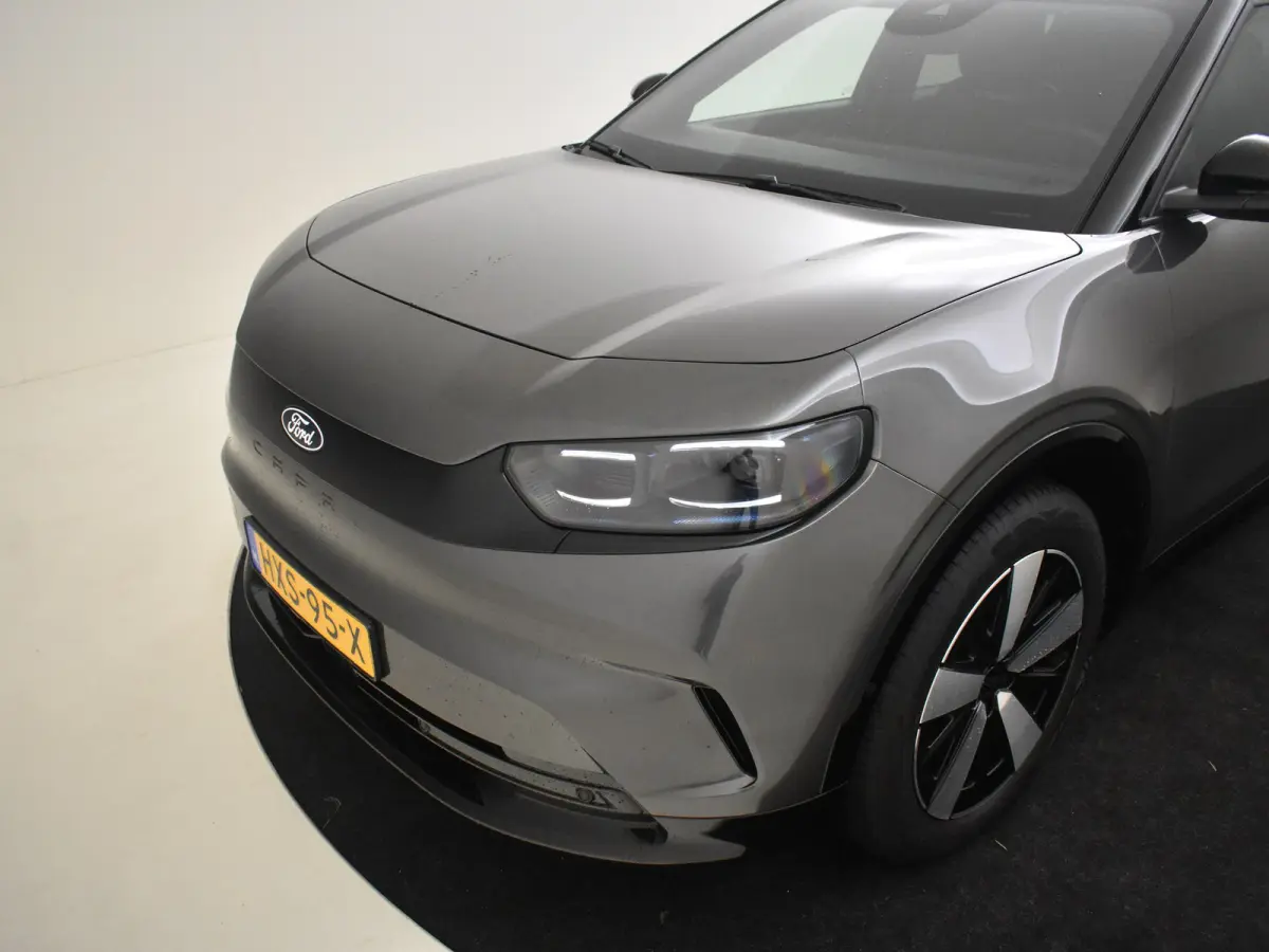 Select Extended Range RWD 77 kWh l Elektr. Stoel incl Memory l Stoel en Stuurverwarming l Head up Display l Camera l