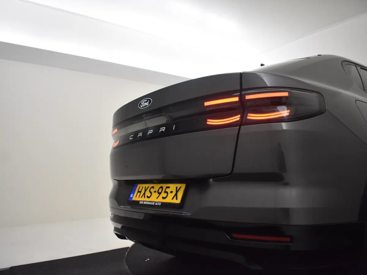 Select Extended Range RWD 77 kWh l Elektr. Stoel incl Memory l Stoel en Stuurverwarming l Head up Display l Camera l