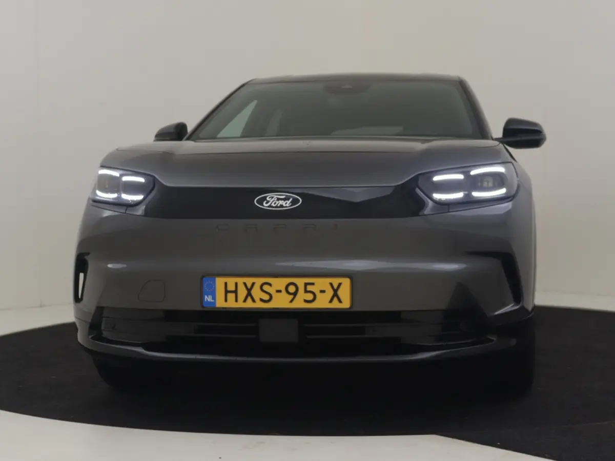 Select Extended Range RWD 77 kWh l Elektr. Stoel incl Memory l Stoel en Stuurverwarming l Head up Display l Camera l